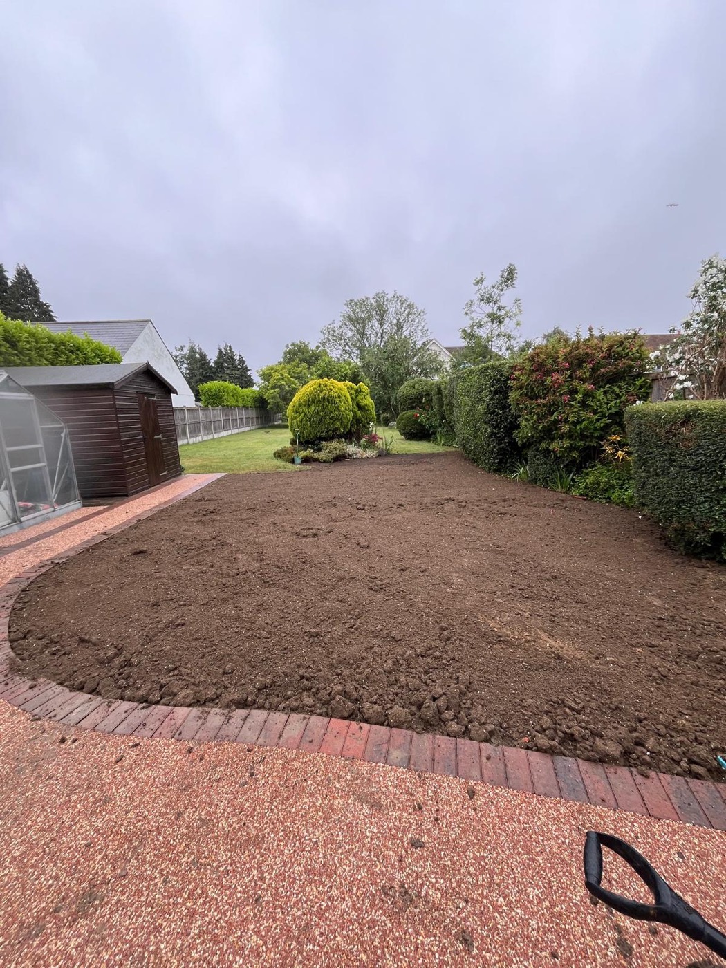 Garden cleared and levelled, ready for new turf